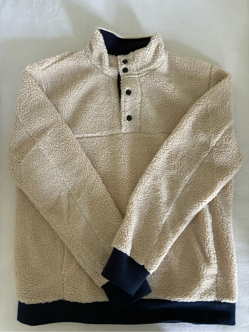 J. Crew Cream Sherpa Snap Pullover with Navy Trim.